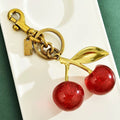 Cherry Valmont — Charm Cereza para Bolso | Gourmandise Dorée