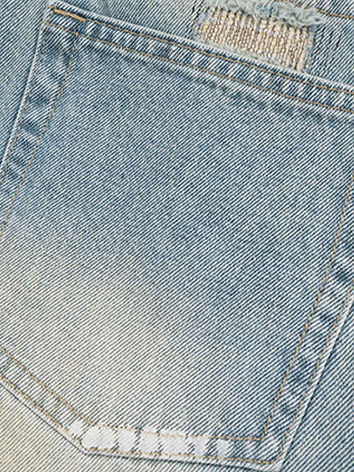 Vaquero Flare Roto Valmont — Distinción urbana irresistible | Denim